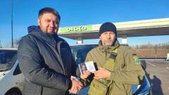 Дунілін отрімує відзнаку від Власенка Фото: Вадим Дунілін